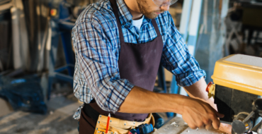 woodworker kitchen maker at workbench