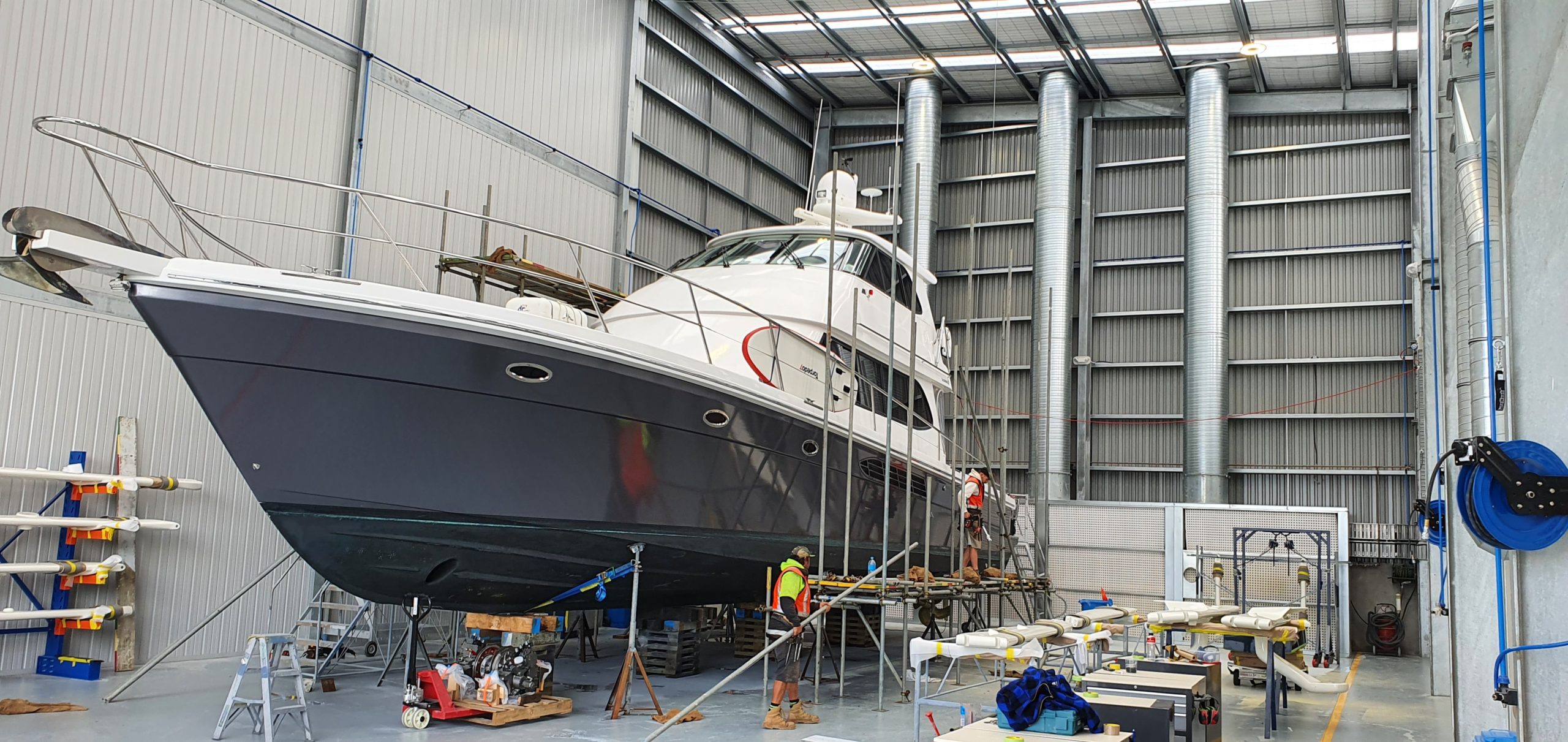 Egmont Air's Marine Spray Booth System for Gloss Boats